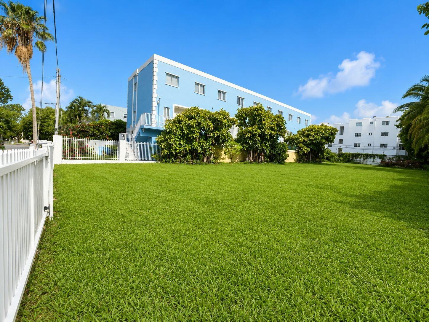 829 Southwest 2nd Street Miami, FL 33130 - Photo 4 of 4 a view of a garden with a building in the background