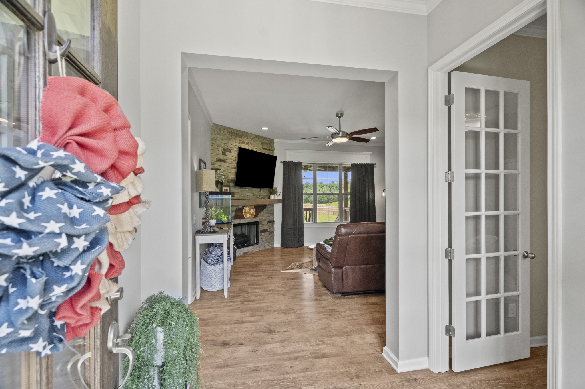 267 Aplin Branch Road Cottontown, TN 37048 - Photo 8 of 56 a living room with furniture and a flat screen tv