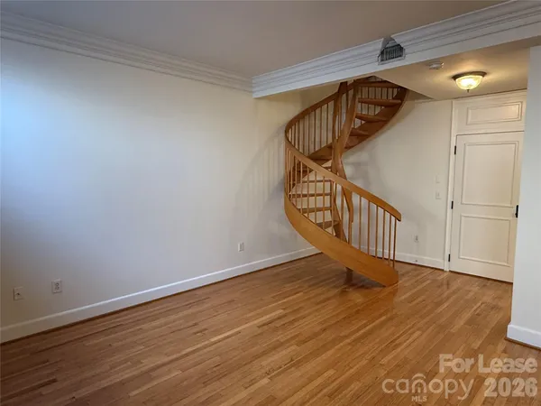 a view of entryway with wooden floor