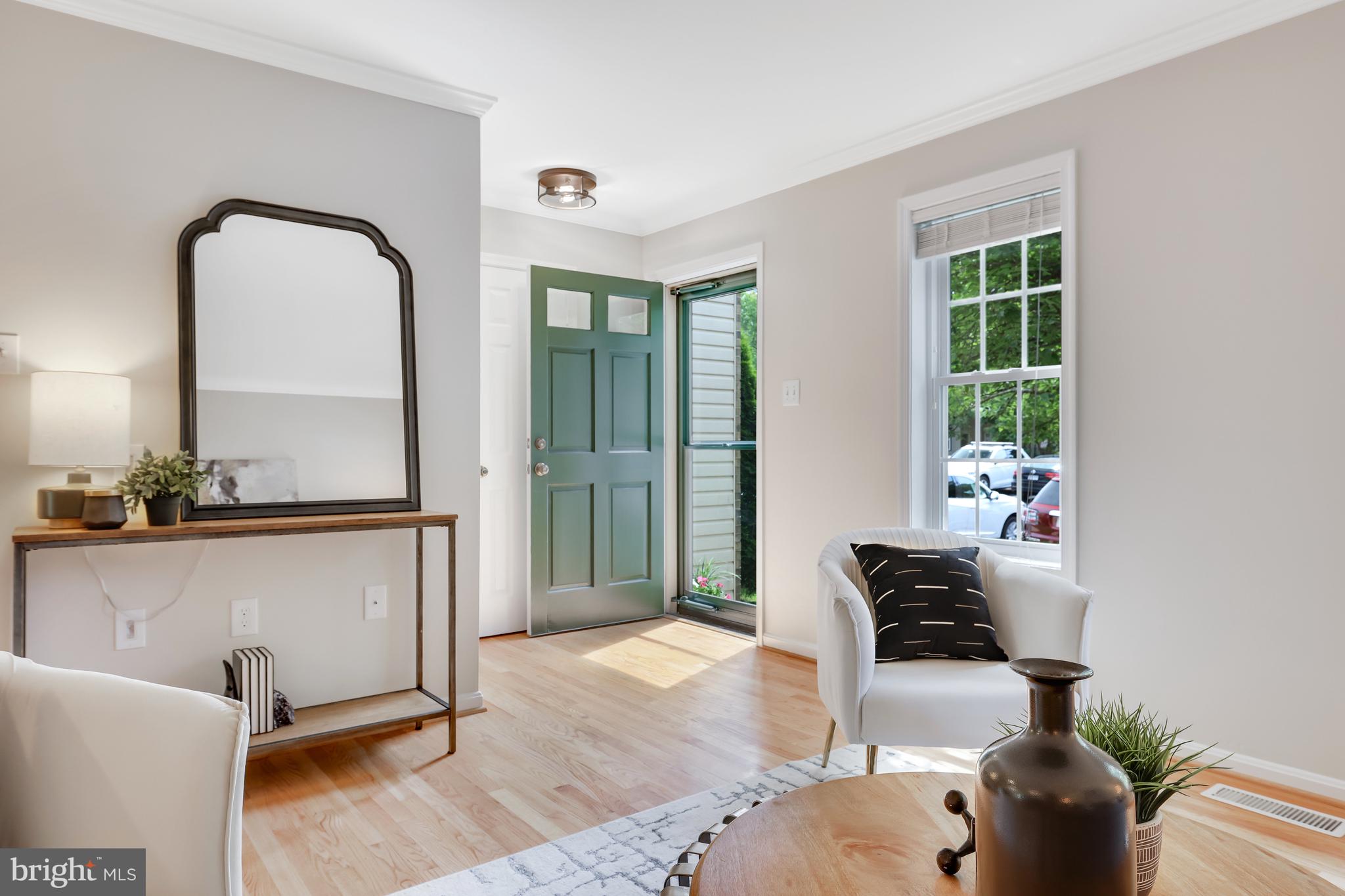 11964 Sentinel Point Court Reston, VA 20191 - Photo 4 of 68 The front storm door brings in natural light.