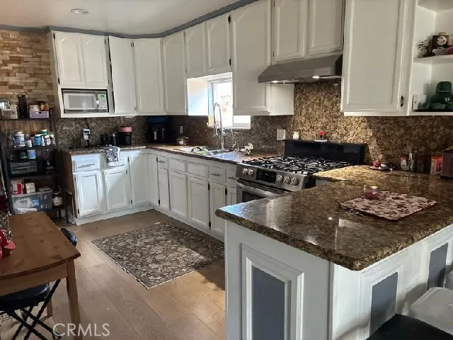 a bedroom with bed and window