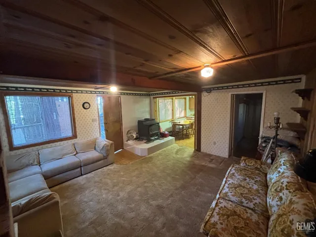 a bed room with furniture and a couch