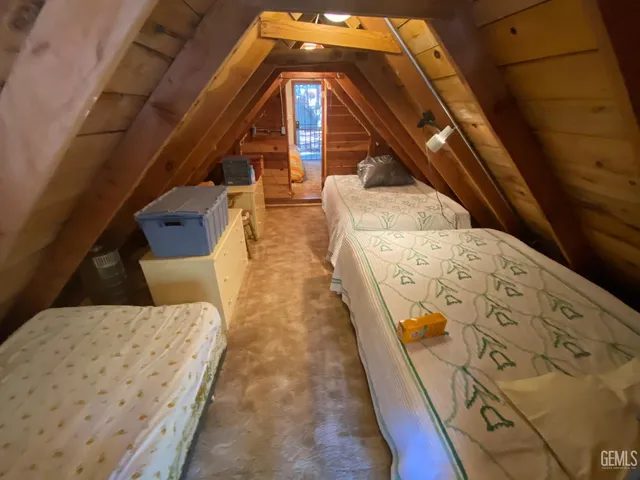 a living room with a table and chairs