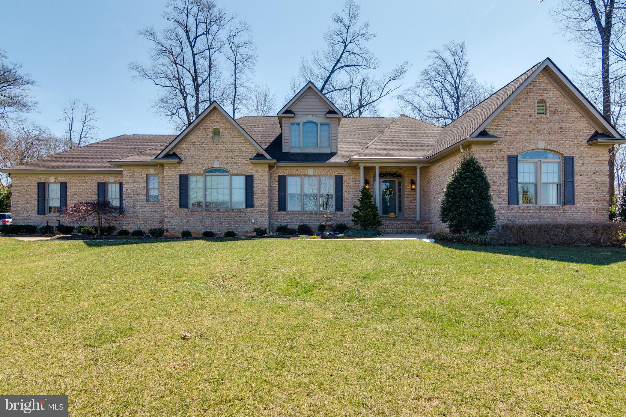 781 Lone Tree Road Westminster, MD 21157 - Photo 1 of 30 a front view of a house with a garden