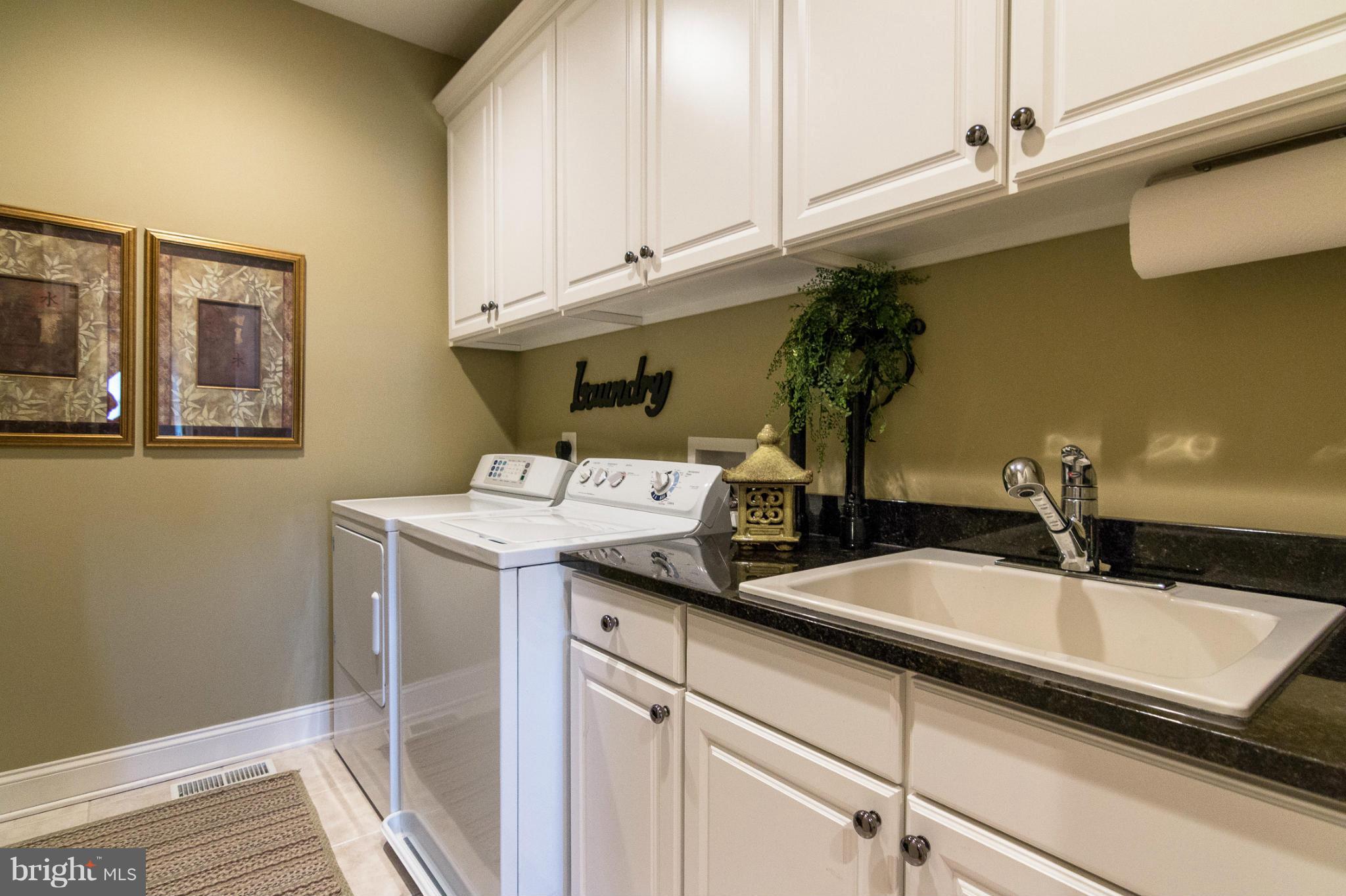781 Lone Tree Road Westminster, MD 21157 - Photo 13 of 30 a bathroom with a sink and a mirror