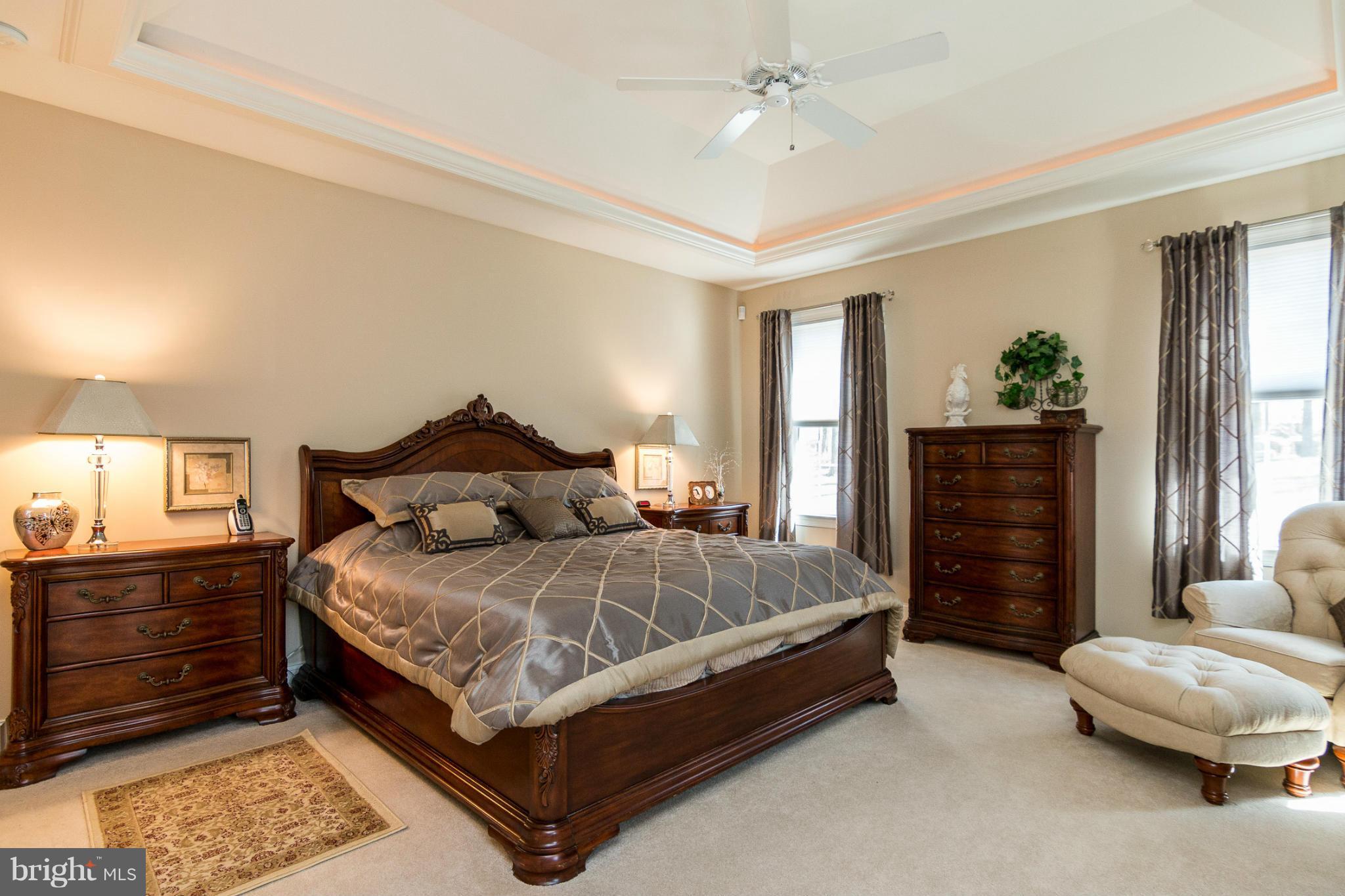 781 Lone Tree Road Westminster, MD 21157 - Photo 14 of 30 a bedroom with a bed and a couch