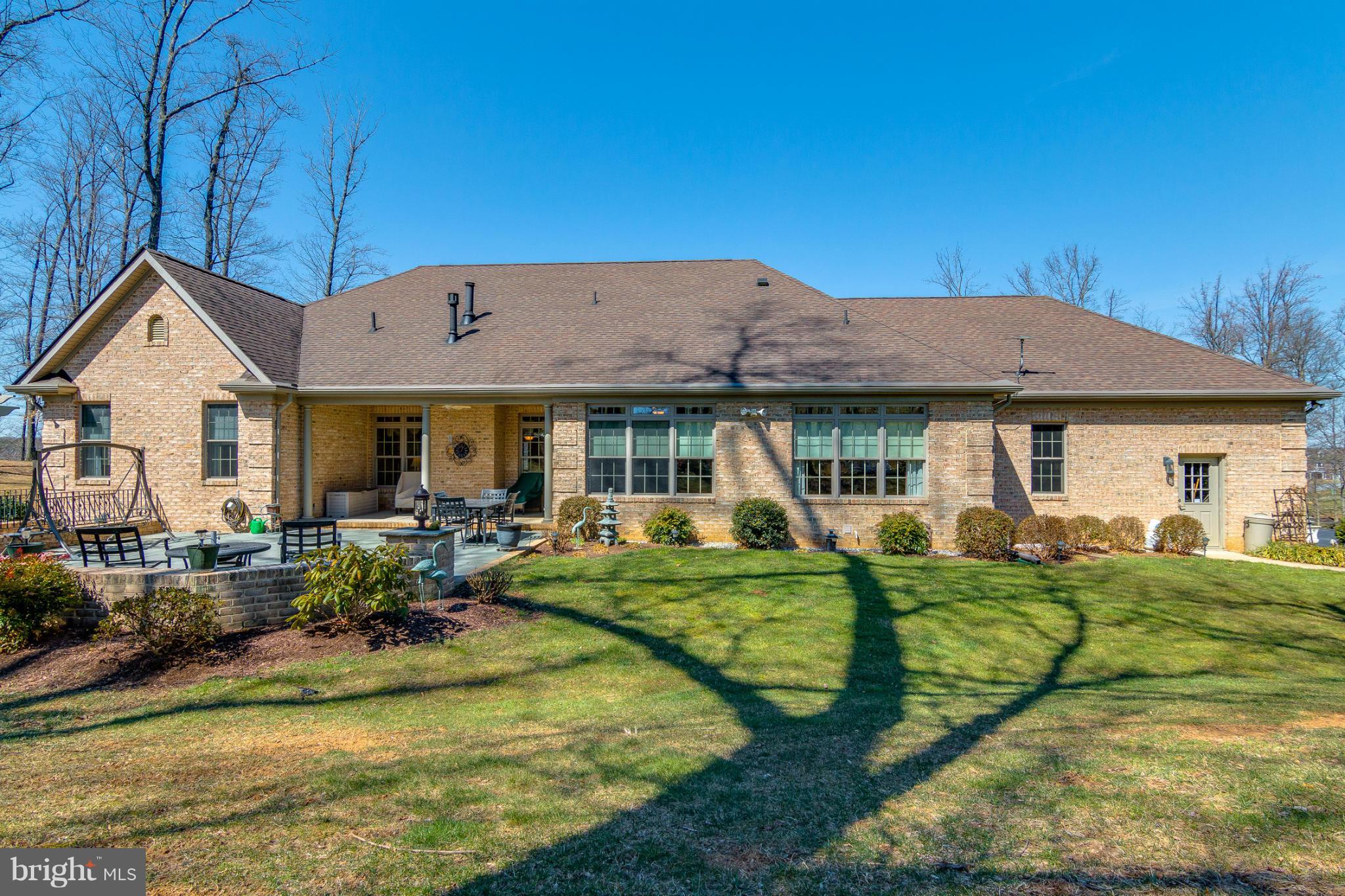 781 Lone Tree Road Westminster, MD 21157 - Photo 28 of 30 a view of house with backyard outdoor seating area and furniture