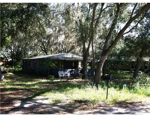 314 Madison Street Minneola, FL 34715 - Photo 1 of 1 a view of a couches in backyard of the house