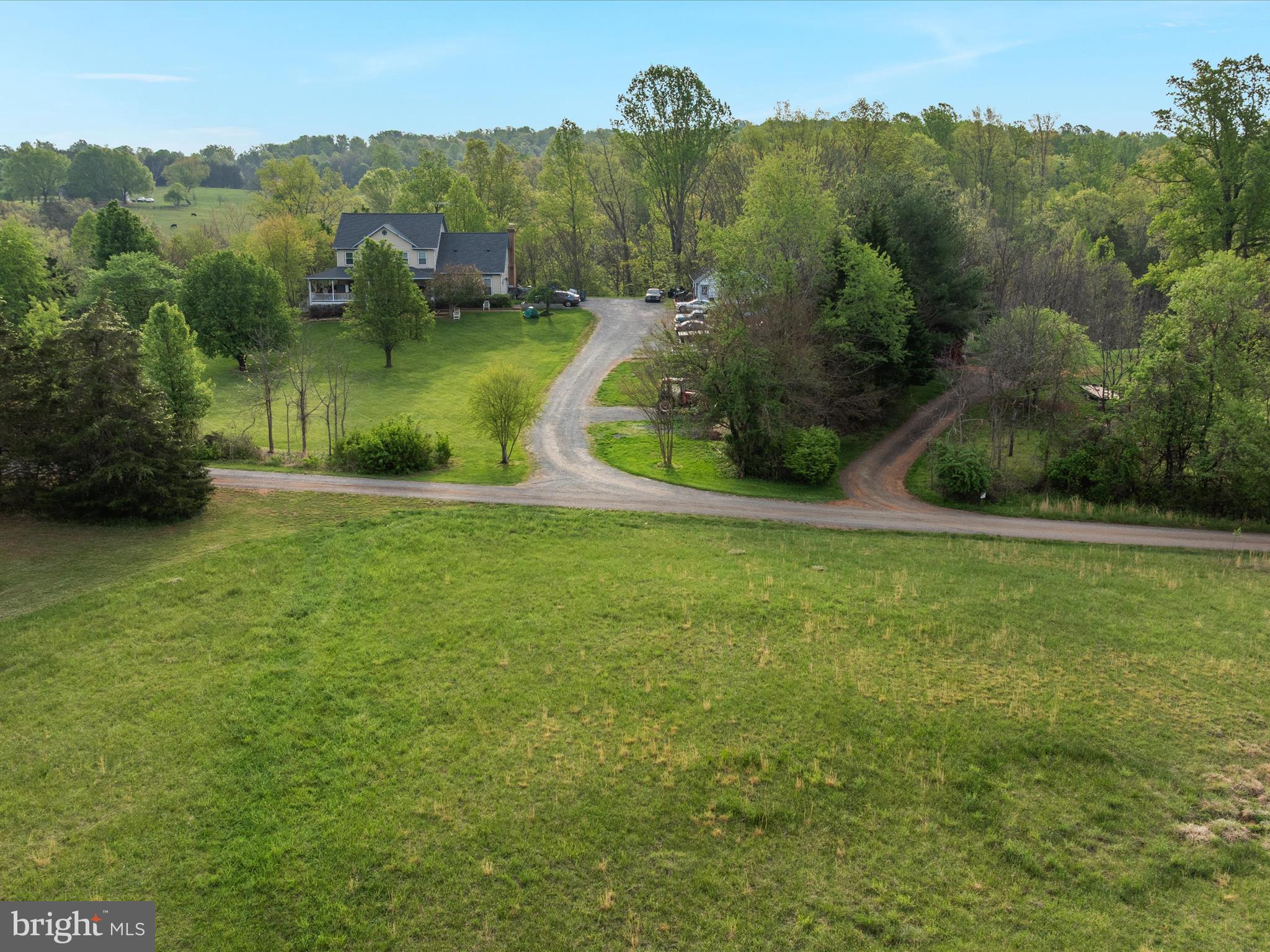 31-92e Jamesons Mill Road Culpeper, VA 22701 - Photo 11 of 16 an aerial view of residential houses with outdoor space and trees
