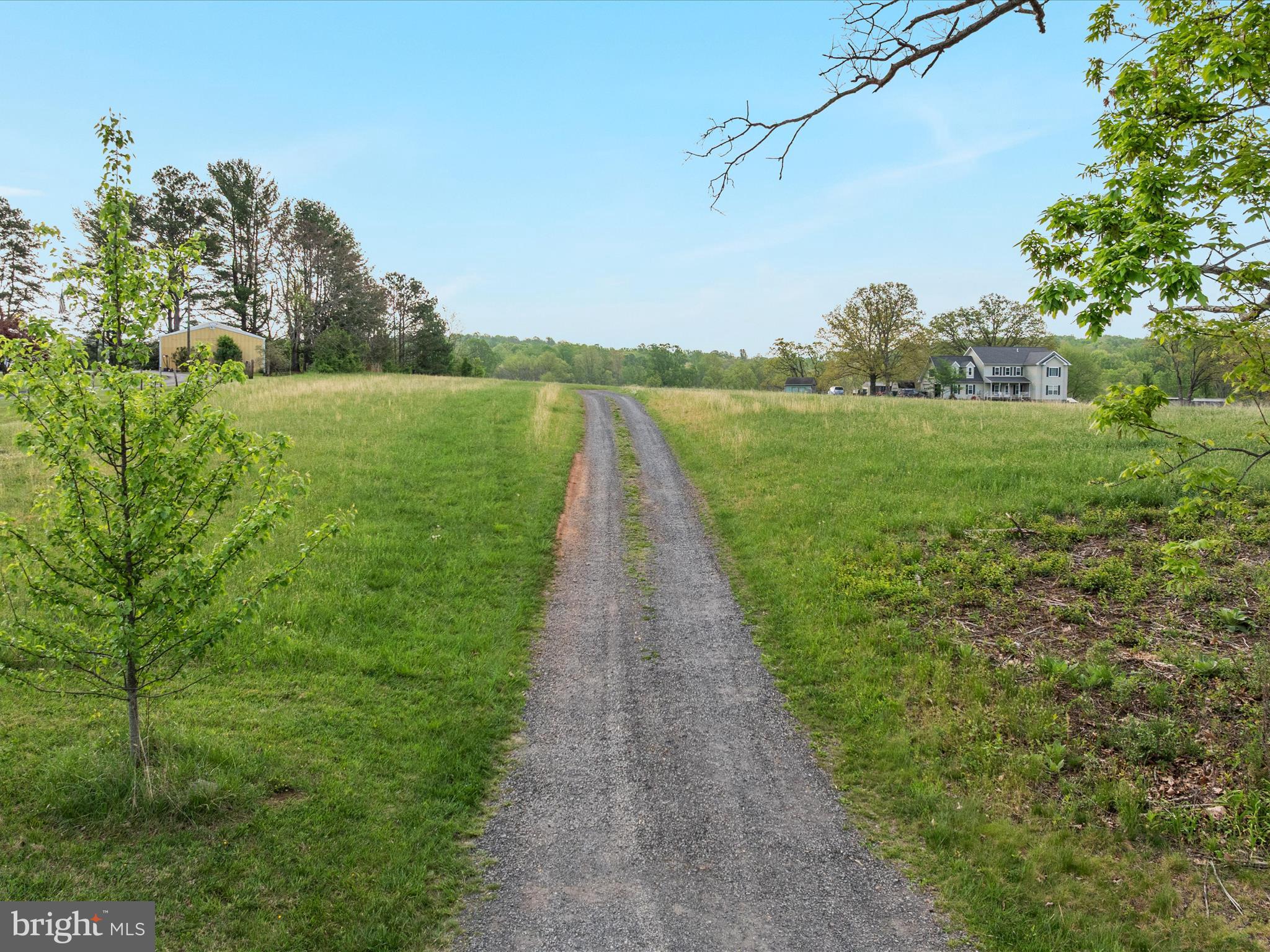 31-92e Jamesons Mill Road Culpeper, VA 22701 - Photo 12 of 16 a view of a garden with an outdoor space