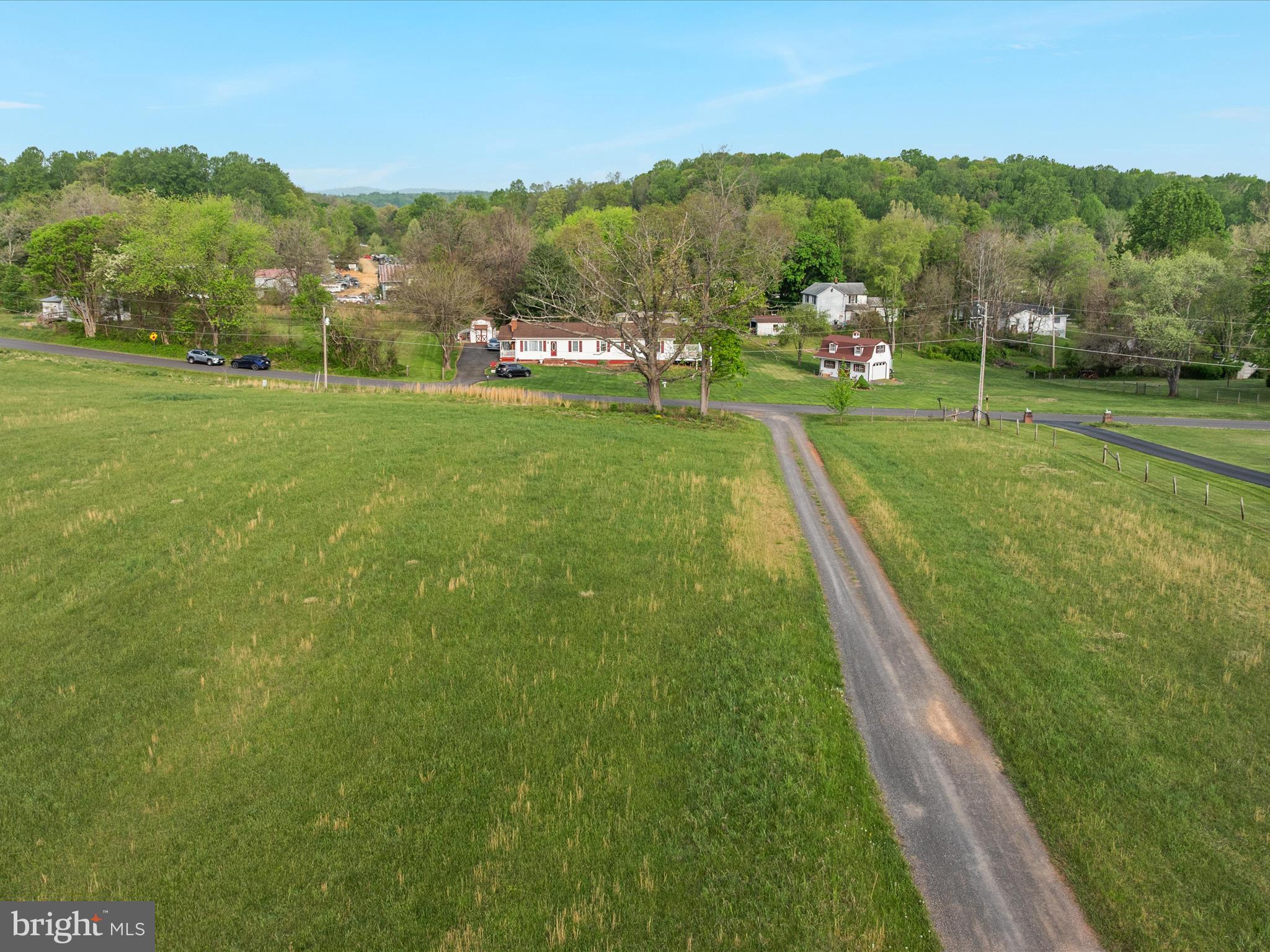 31-92e Jamesons Mill Road Culpeper, VA 22701 - Photo 13 of 16 a view of grassy field with mountain