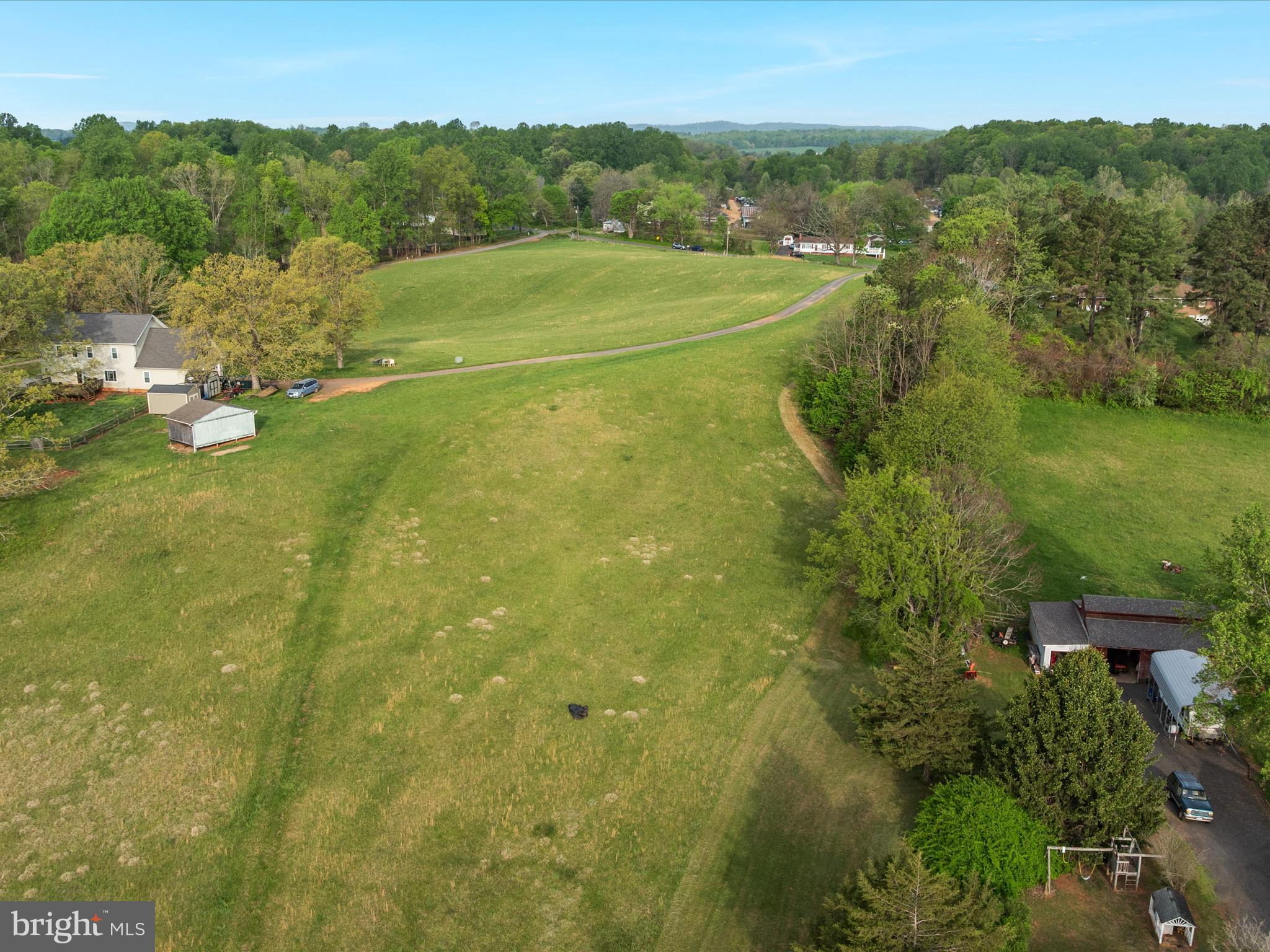 31-92e Jamesons Mill Road Culpeper, VA 22701 - Photo 5 of 16 a view of a field with an ocean