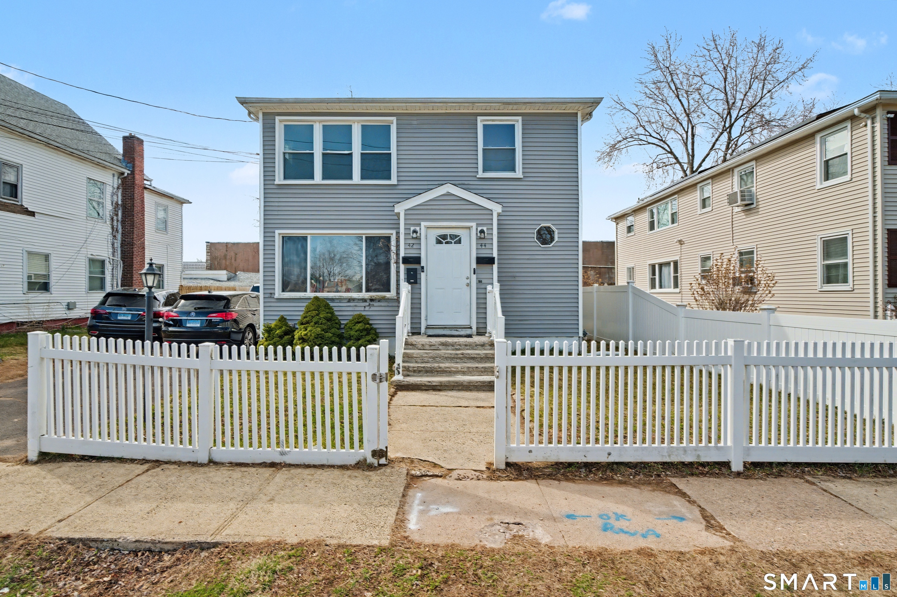 42 Pine Street Hamden, CT 06514 - Photo 1 of 1 a front view of a house with a porch
