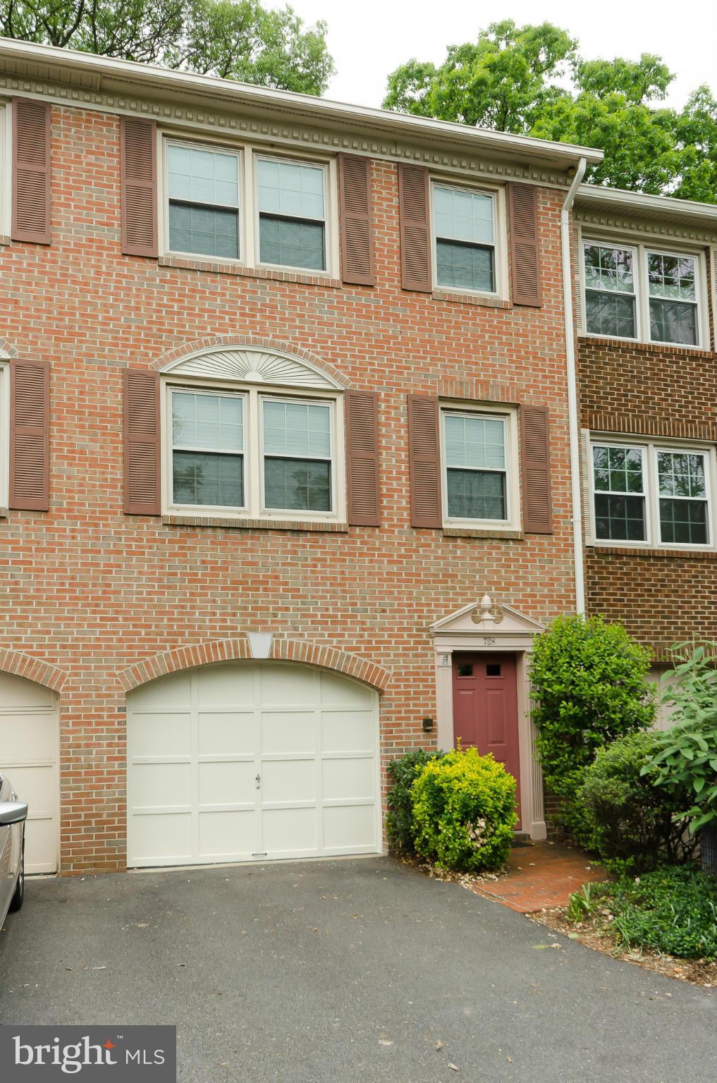 728 West Glebe Road Alexandria, VA 22305 - Photo 2 of 28 a front view of a house with garden