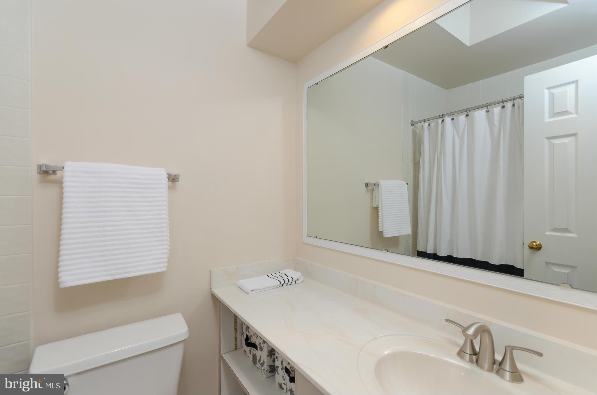 728 West Glebe Road Alexandria, VA 22305 - Photo 13 of 28 a bathroom with a sink and a toilet