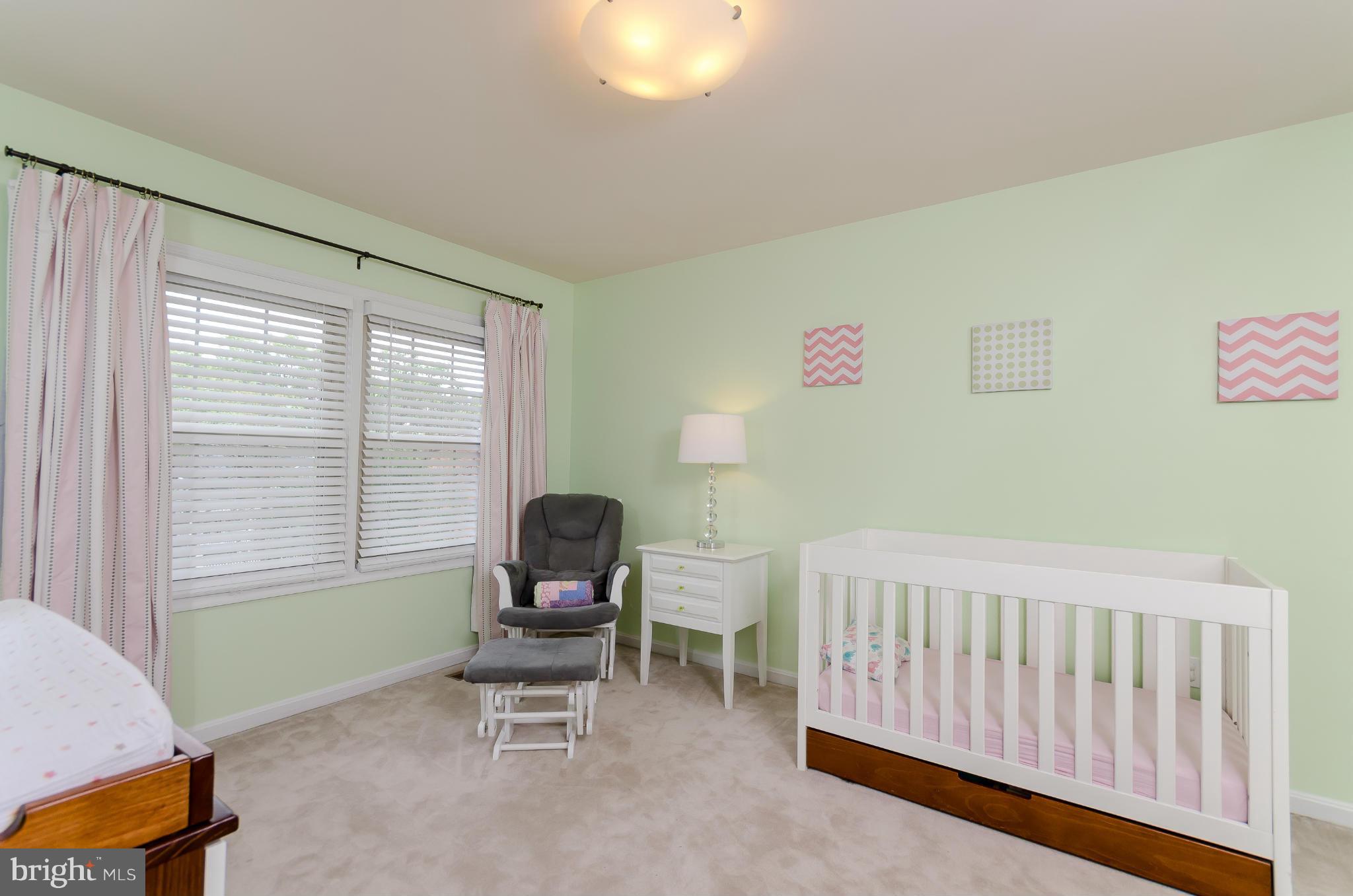 728 West Glebe Road Alexandria, VA 22305 - Photo 14 of 28 a living room with furniture and a window