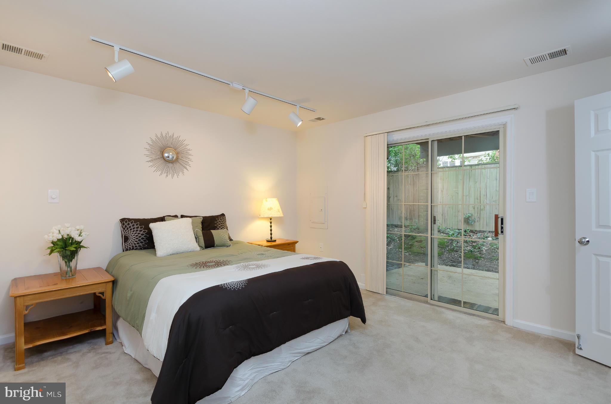 728 West Glebe Road Alexandria, VA 22305 - Photo 17 of 28 a bedroom with a bed and a window