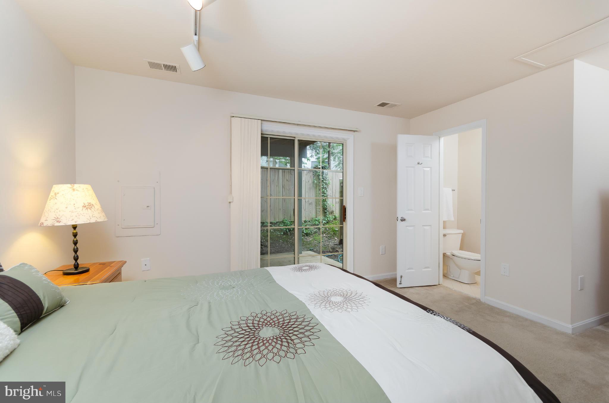 728 West Glebe Road Alexandria, VA 22305 - Photo 19 of 28 a bedroom with a bed and a window