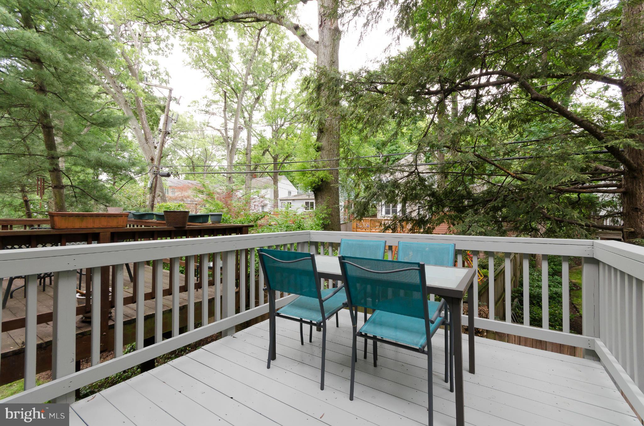 728 West Glebe Road Alexandria, VA 22305 - Photo 20 of 28 a view of a chair and table on the wooden deck