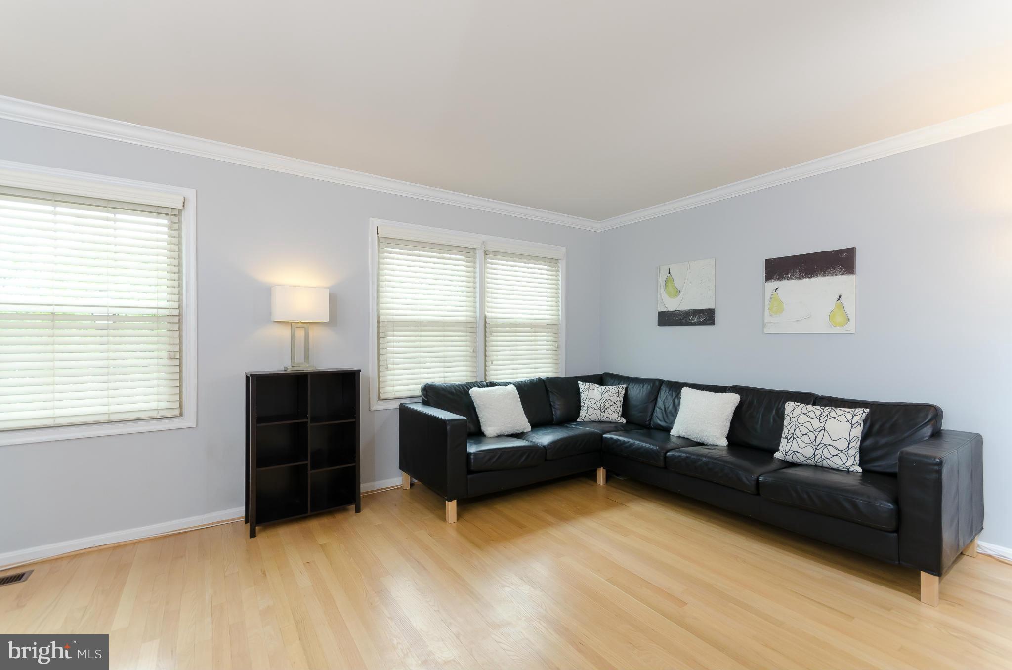 728 West Glebe Road Alexandria, VA 22305 - Photo 8 of 28 a living room with furniture and a window