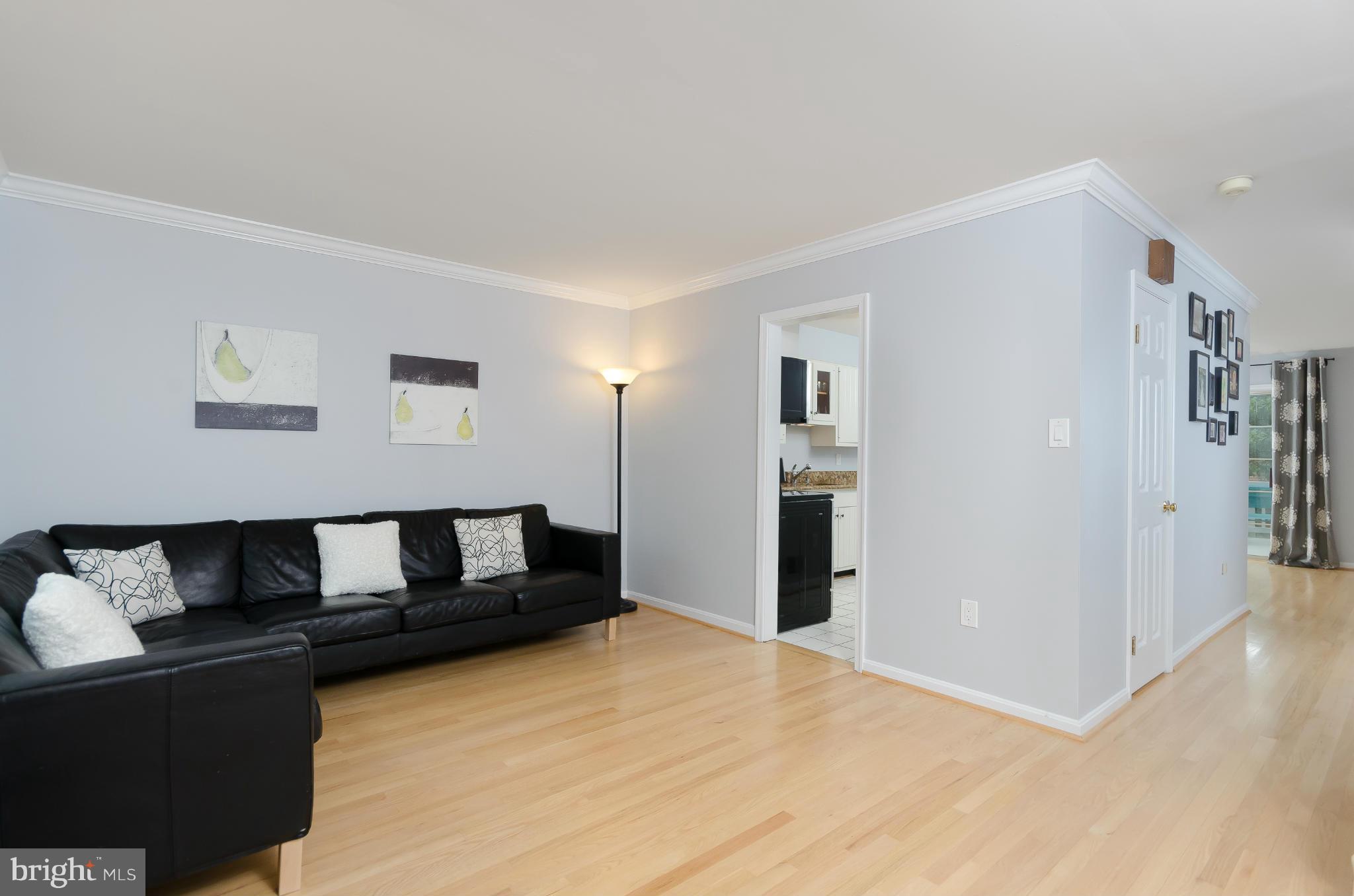 728 West Glebe Road Alexandria, VA 22305 - Photo 9 of 28 a living room with furniture and wooden floor