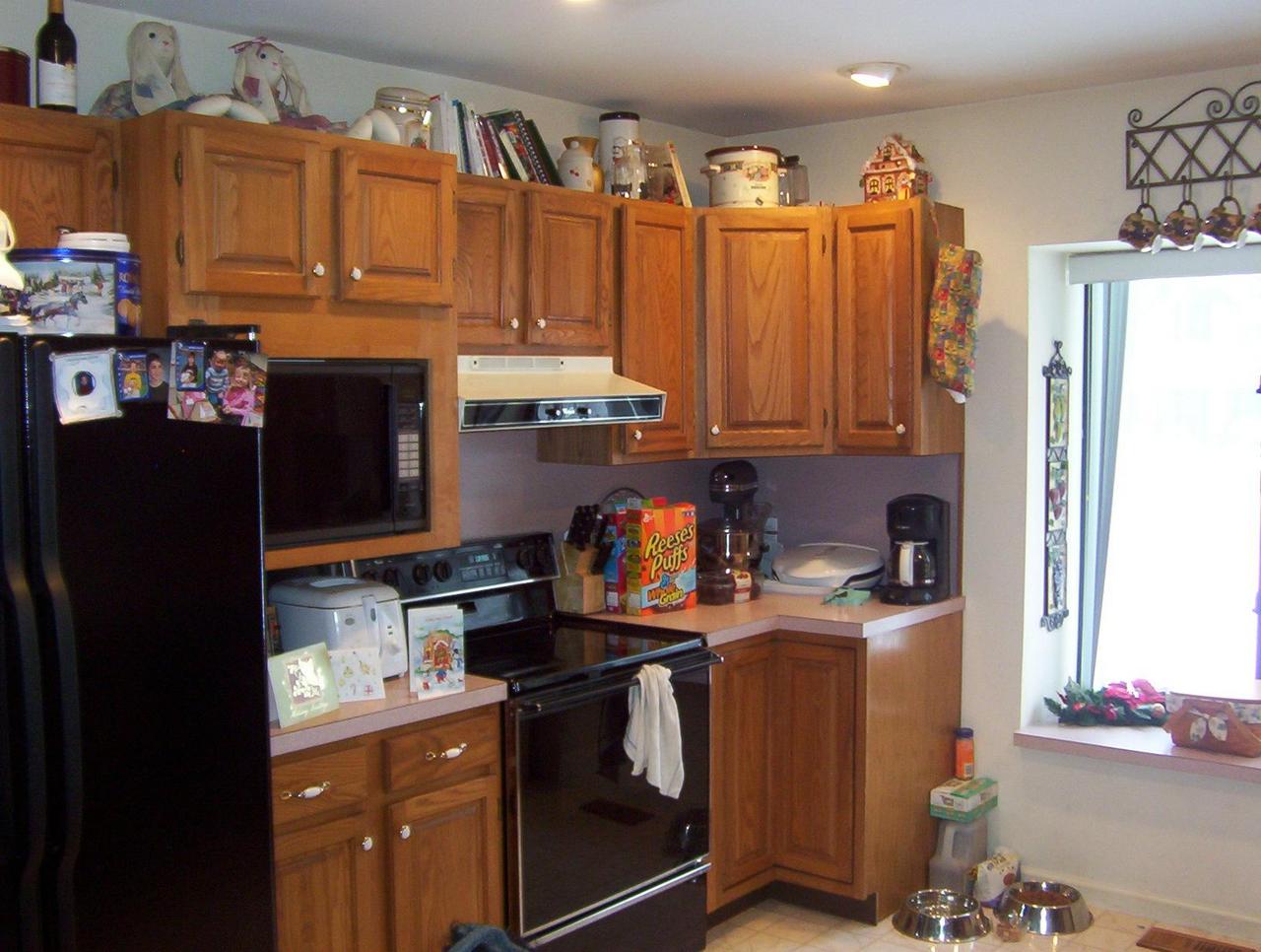 220 Laurel Road Pocono Summit, PA 18346 - Photo 5 of 5 a kitchen with stainless steel appliances granite countertop a refrigerator a stove a sink and dishwasher with wooden floor