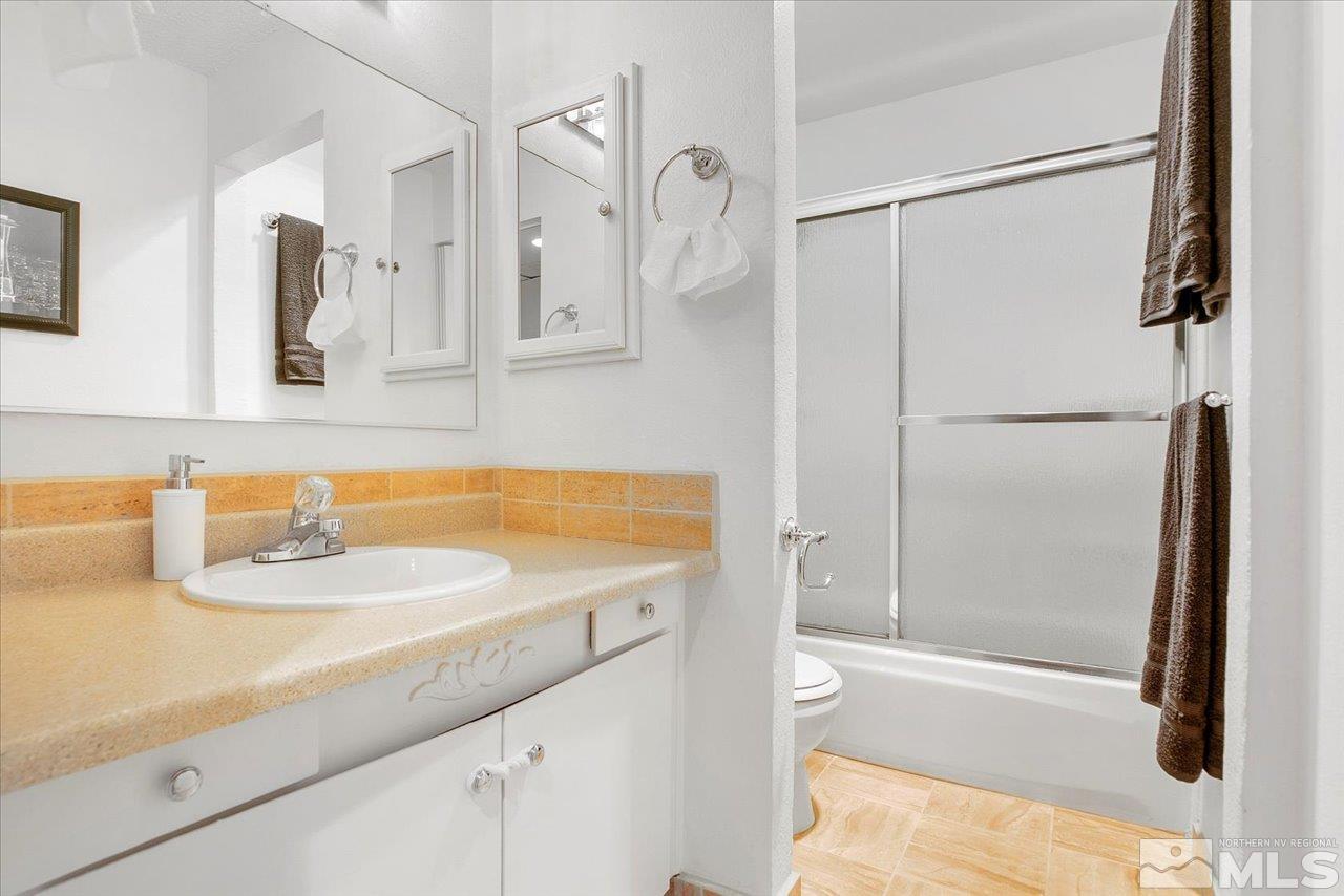 2750 Plumas Street, Unit 219 Reno, NV 89509 - Photo 12 of 22 a bathroom with a sink and a shower