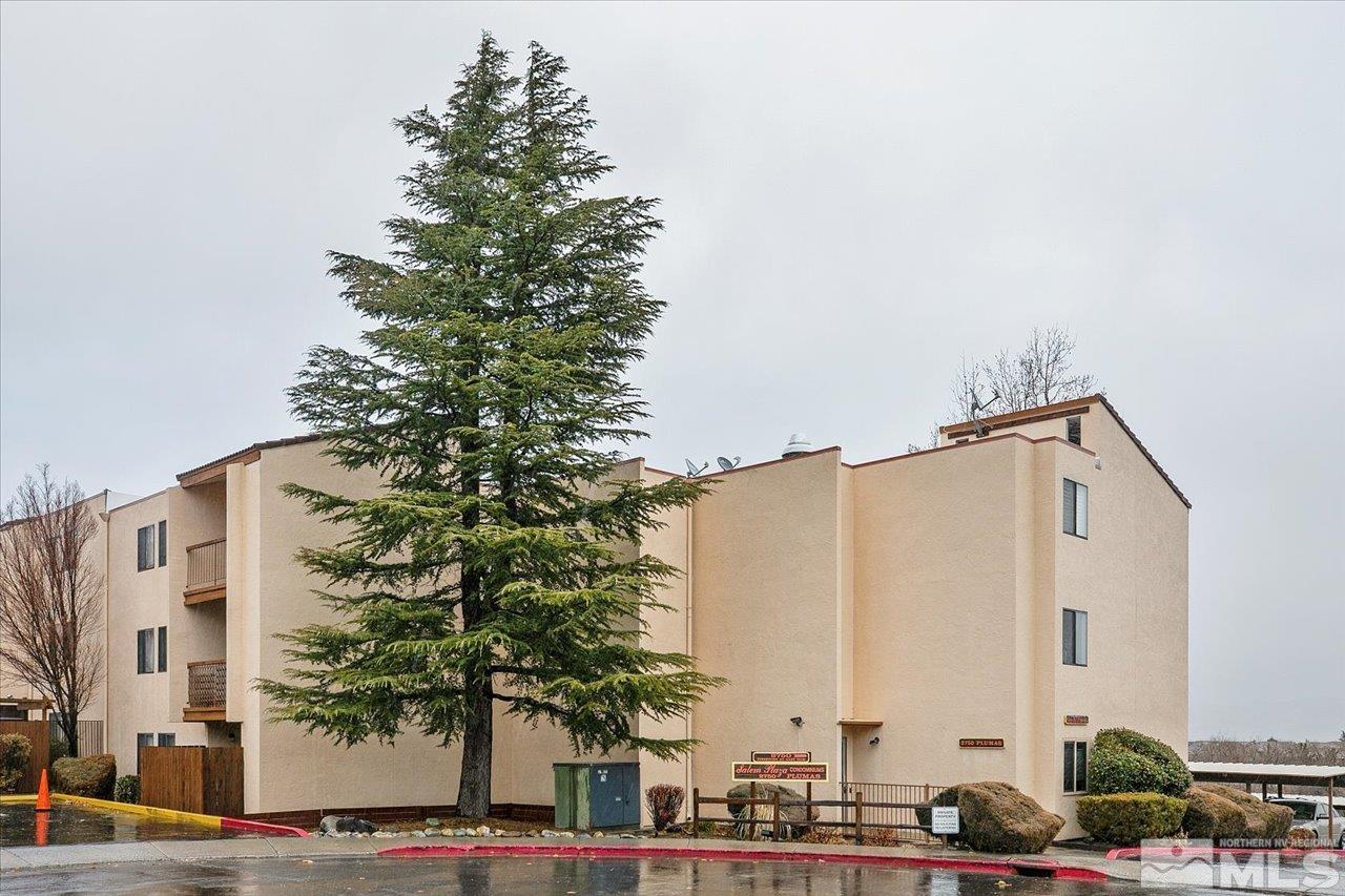 2750 Plumas Street, Unit 219 Reno, NV 89509 - Photo 21 of 22 a view of a tall building next to a road