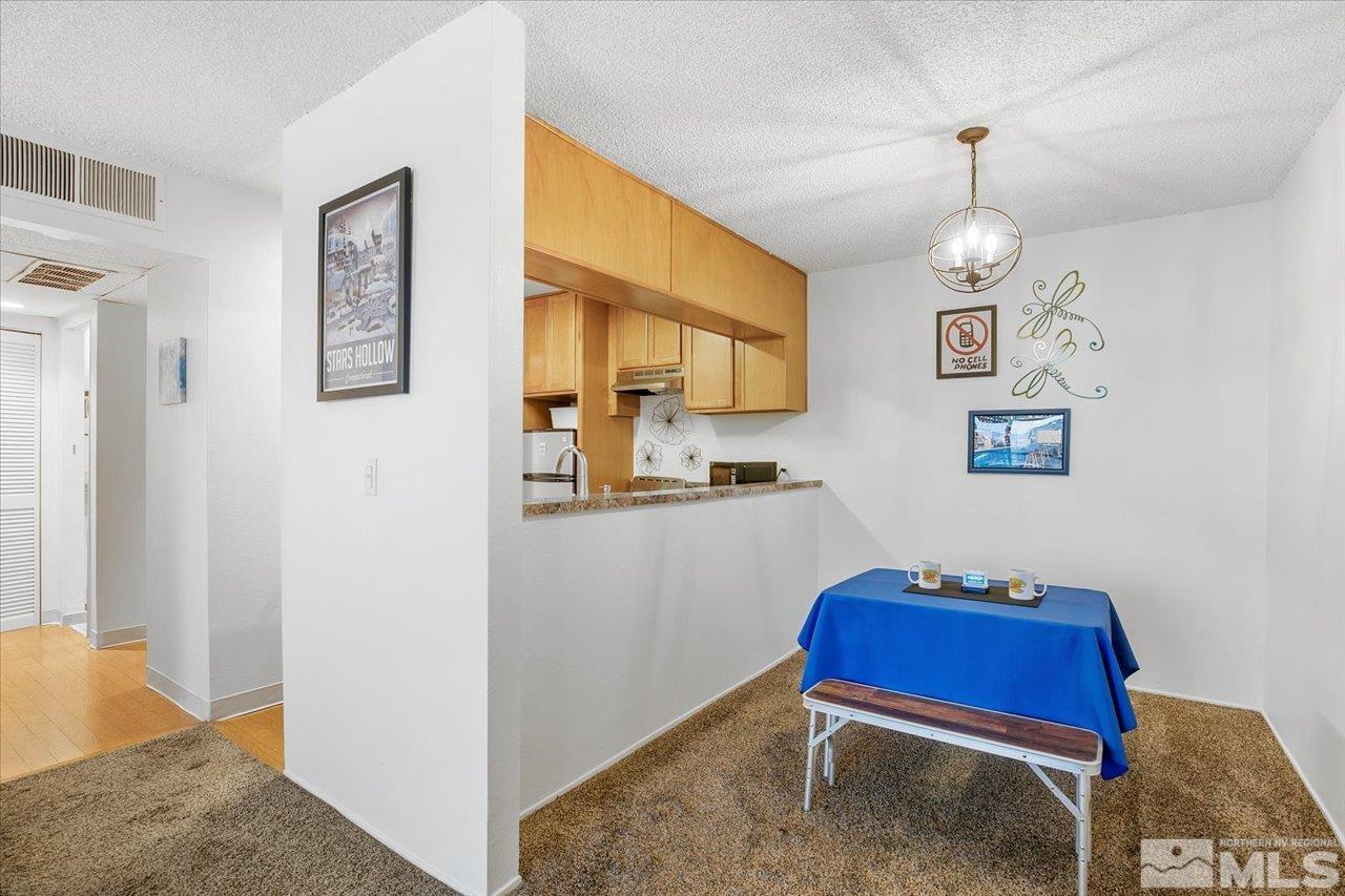 2750 Plumas Street, Unit 219 Reno, NV 89509 - Photo 7 of 22 a view of a livingroom with furniture