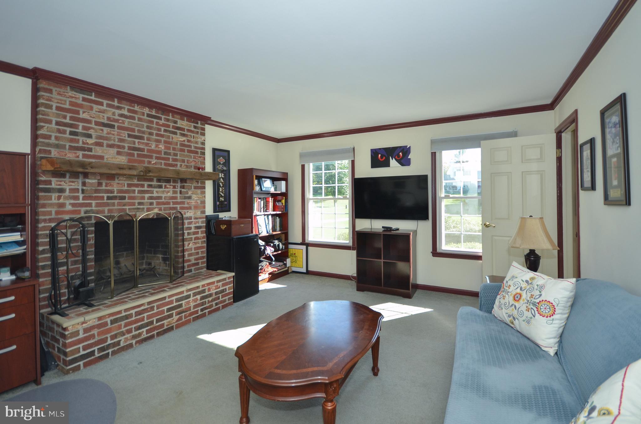 14608 Quaker Bottom Road Sparks, MD 21152 - Photo 10 of 24 FAMILY ROOM W/WOOD BURNING BRICK FIREPLACE
