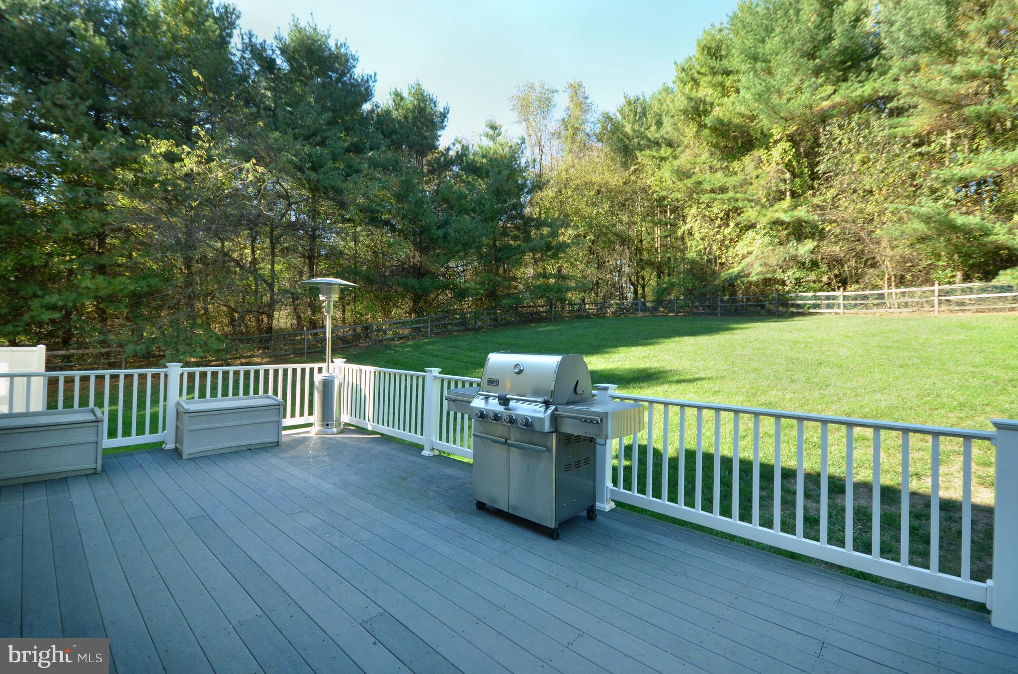 14608 Quaker Bottom Road Sparks, MD 21152 - Photo 20 of 24 EASY CARE DECK BACKS TO SCENIC VIEW OF TREES