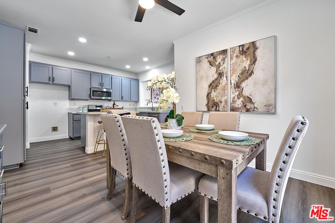 38 Windward Way Buena Park, CA 90621 - Photo 20 of 71 a view of a dining room with furniture window and wooden floor