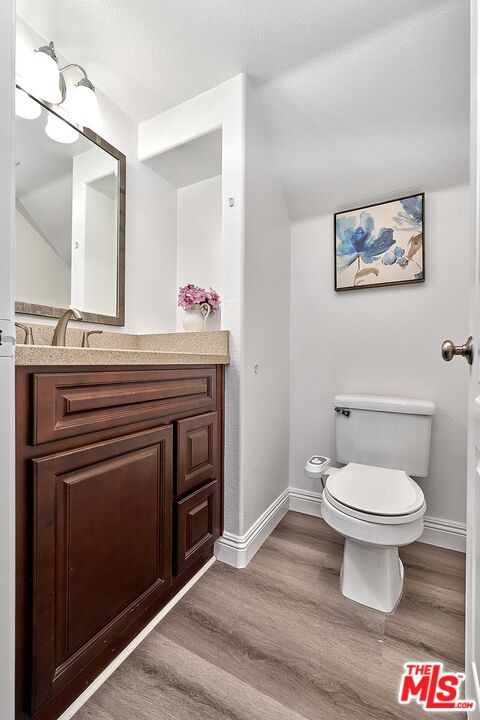 38 Windward Way Buena Park, CA 90621 - Photo 22 of 71 a bathroom with a sink and a toilet