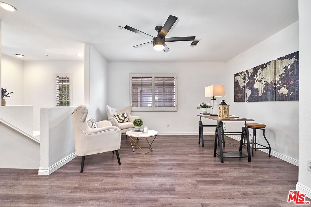 38 Windward Way Buena Park, CA 90621 - Photo 26 of 71 a living room with furniture a window and a table