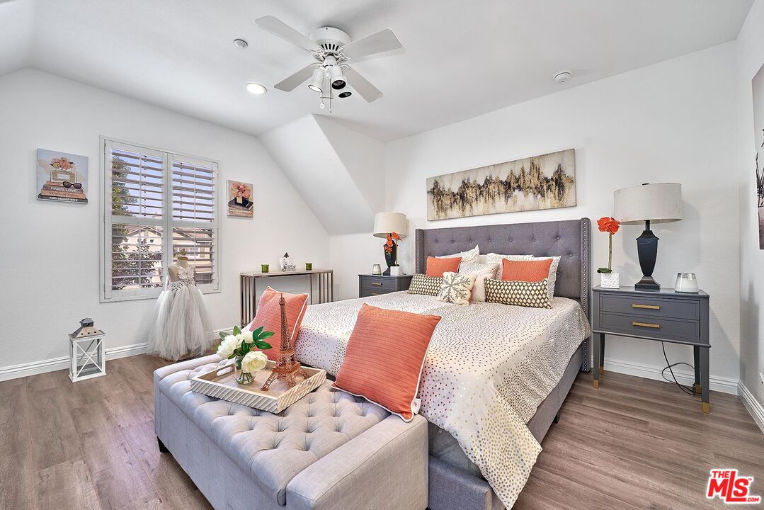 38 Windward Way Buena Park, CA 90621 - Photo 30 of 71 a bedroom with furniture and a wooden floor