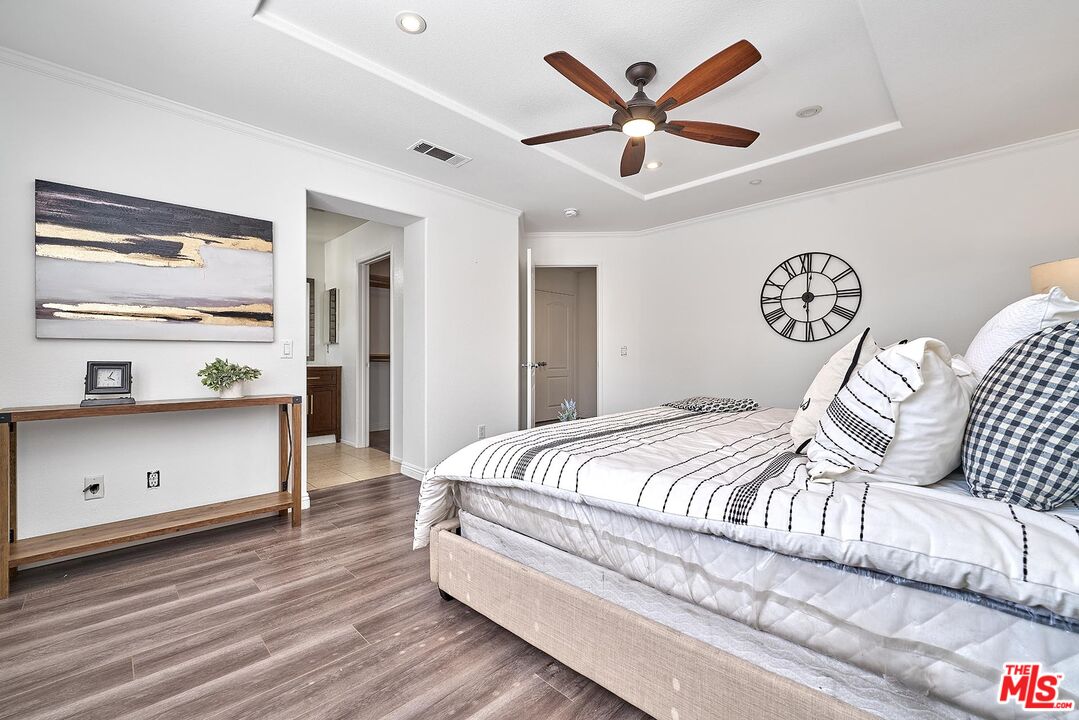 38 Windward Way Buena Park, CA 90621 - Photo 42 of 71 a bedroom with a bed and dresser