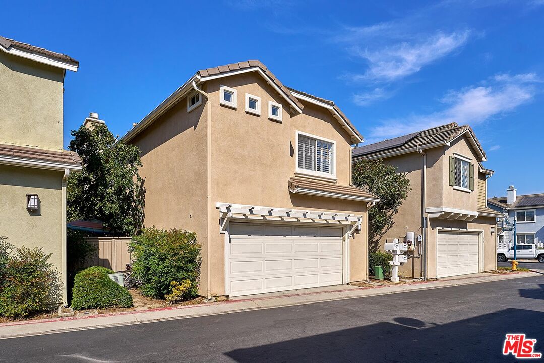 38 Windward Way Buena Park, CA 90621 - Photo 53 of 71 a front view of a house with a yard