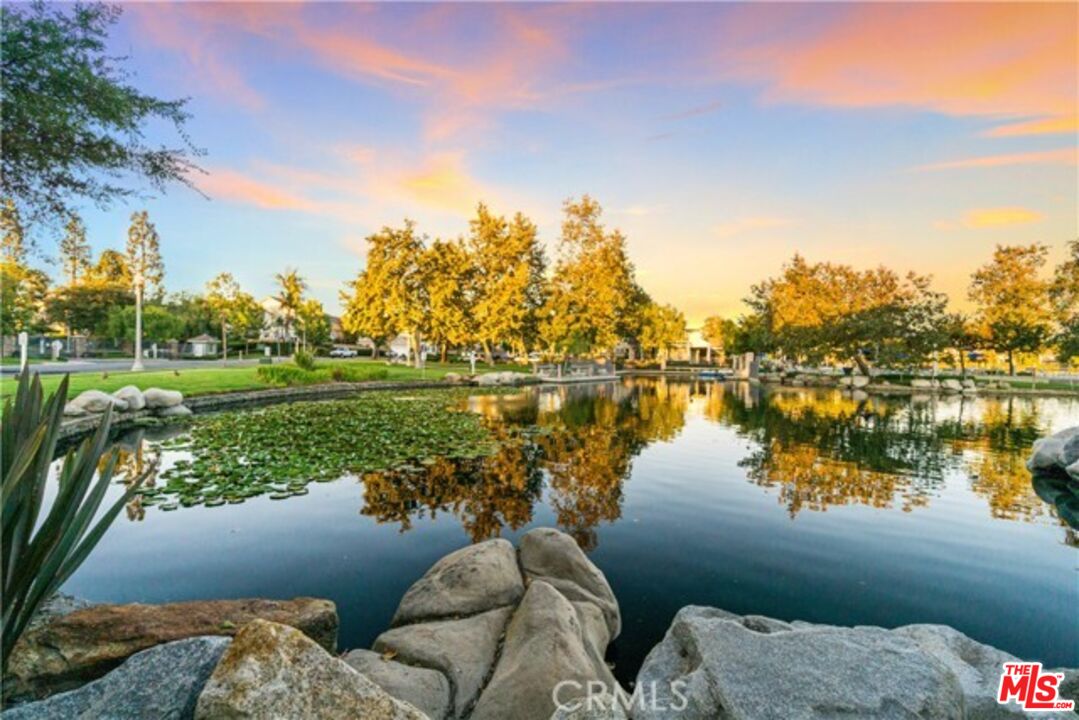 38 Windward Way Buena Park, CA 90621 - Photo 62 of 71 a view of a lake with couches in the patio