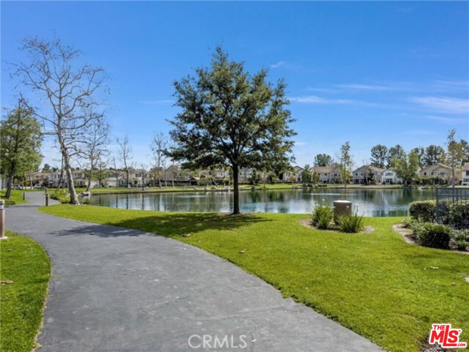 38 Windward Way Buena Park, CA 90621 - Photo 65 of 71 a view of a lake with houses in the background