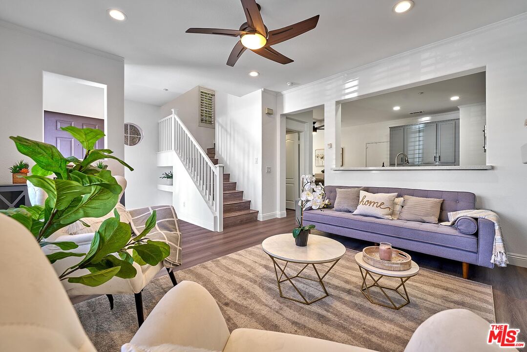 38 Windward Way Buena Park, CA 90621 - Photo 8 of 71 a living room with furniture potted plant and a ceiling fan
