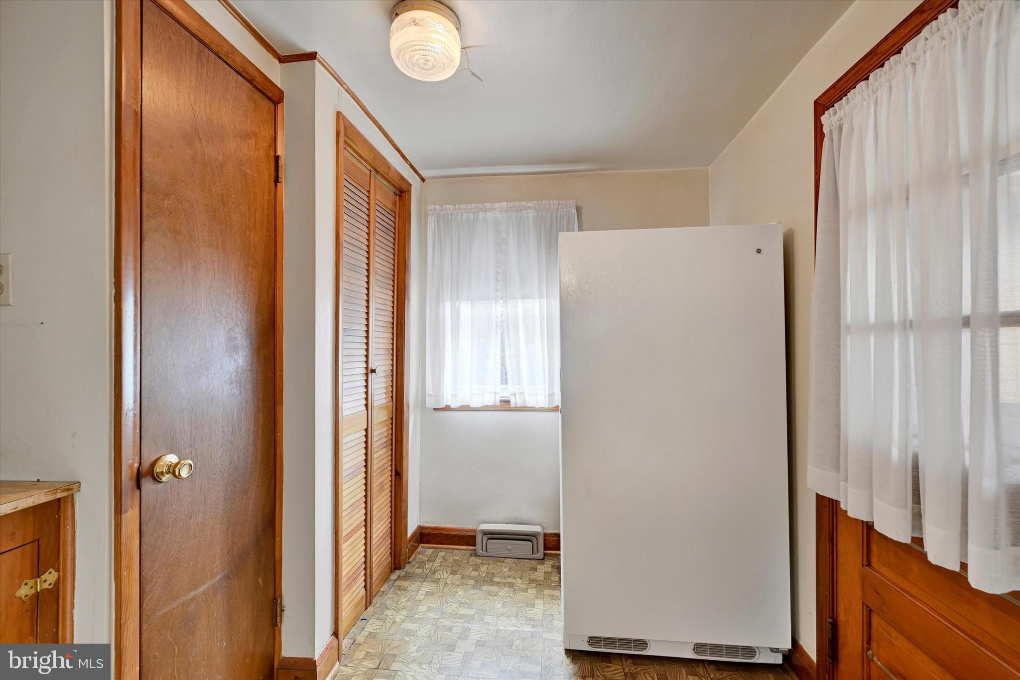 7437 New Cut Road Kingsville, MD 21087 - Photo 13 of 56 a view of a hallway with closet area