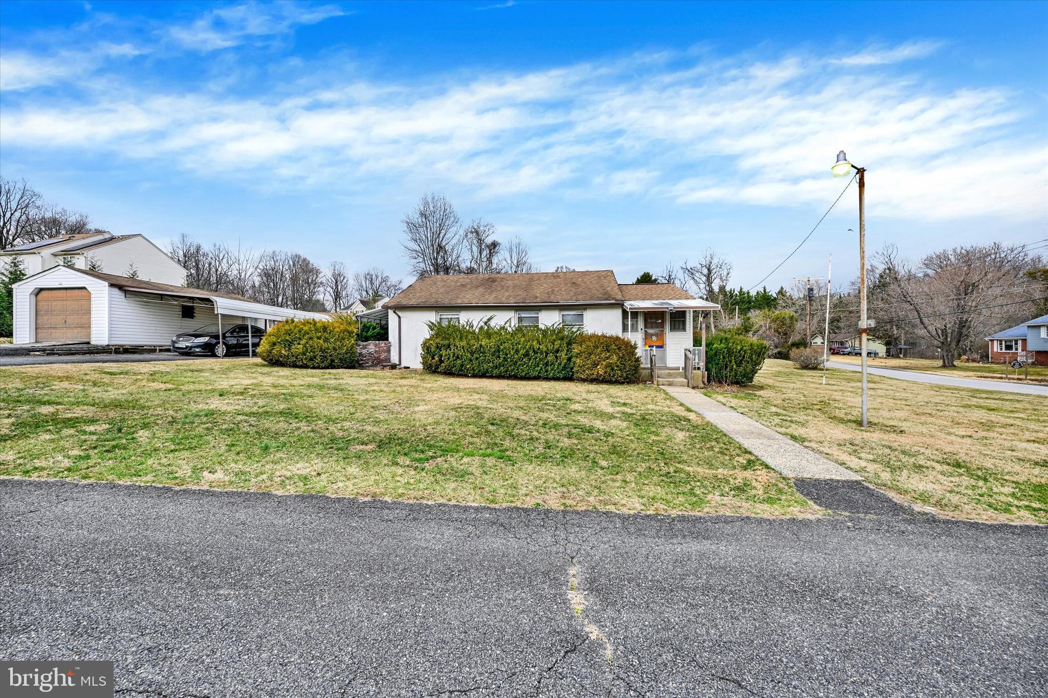 7437 New Cut Road Kingsville, MD 21087 - Photo 2 of 56 a view of a house with a yard