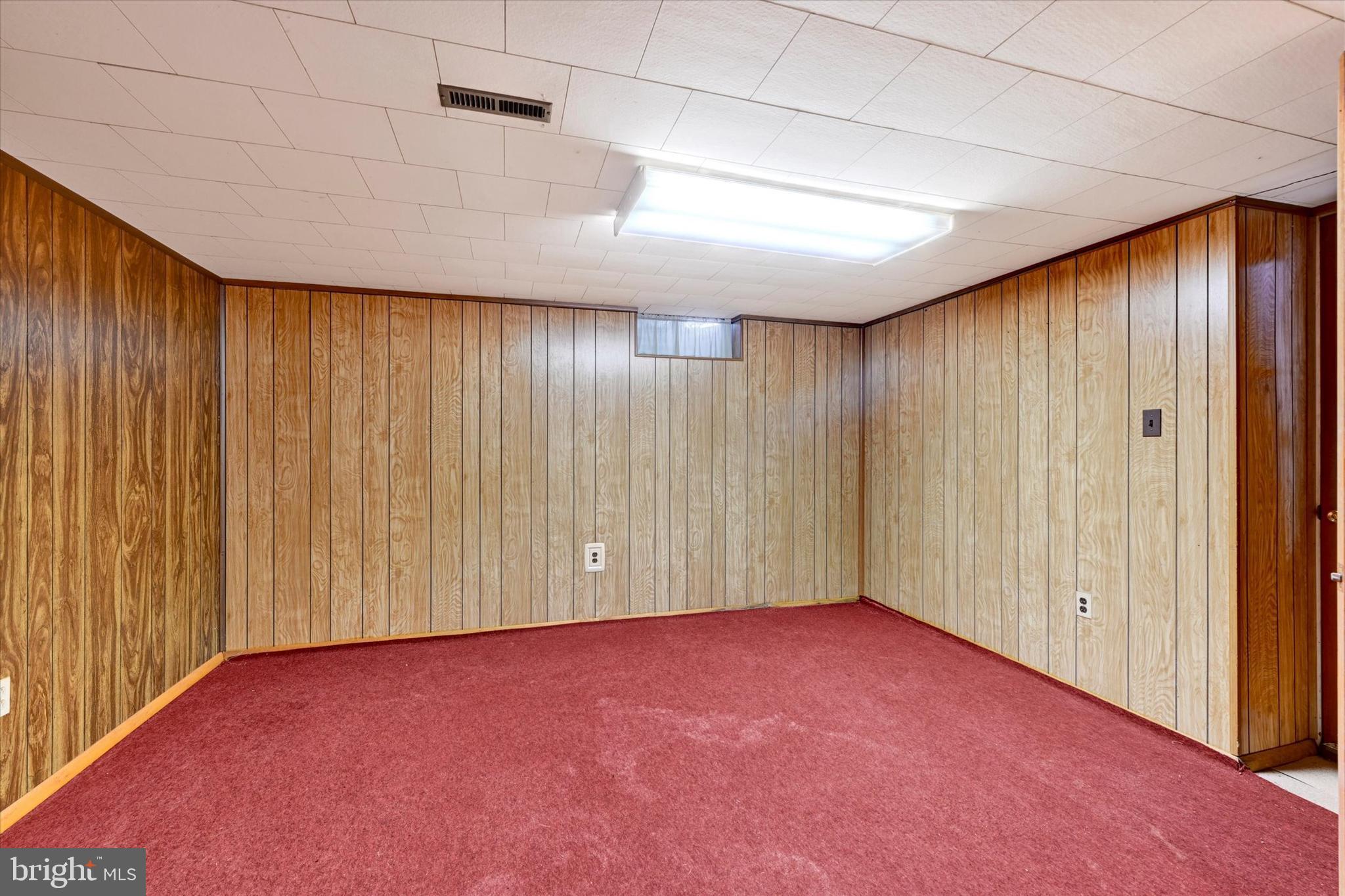 7437 New Cut Road Kingsville, MD 21087 - Photo 21 of 56 an empty room with a wooden walls