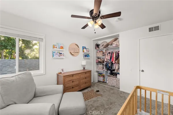 a living room with furniture and window