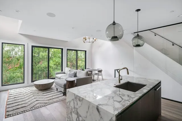 a living room with furniture and window
