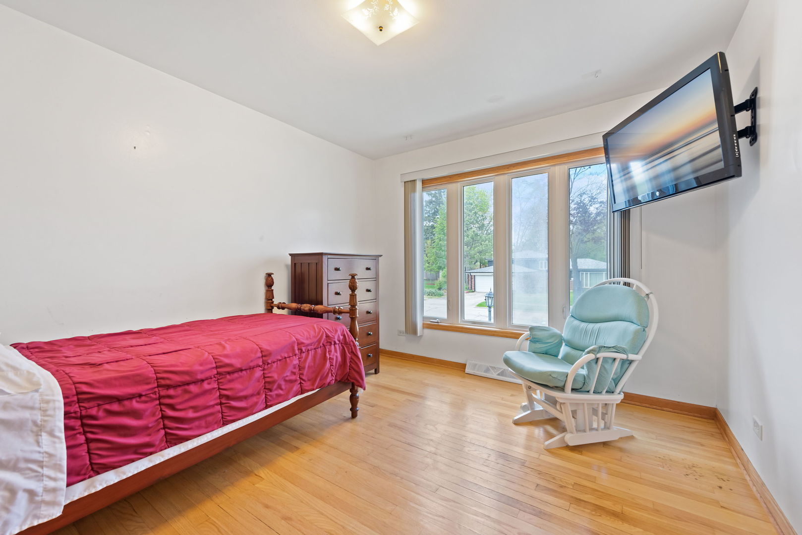 696 Lombardy Lane Deerfield, IL 60015 - Photo 14 of 26 a bedroom with a bed and chair