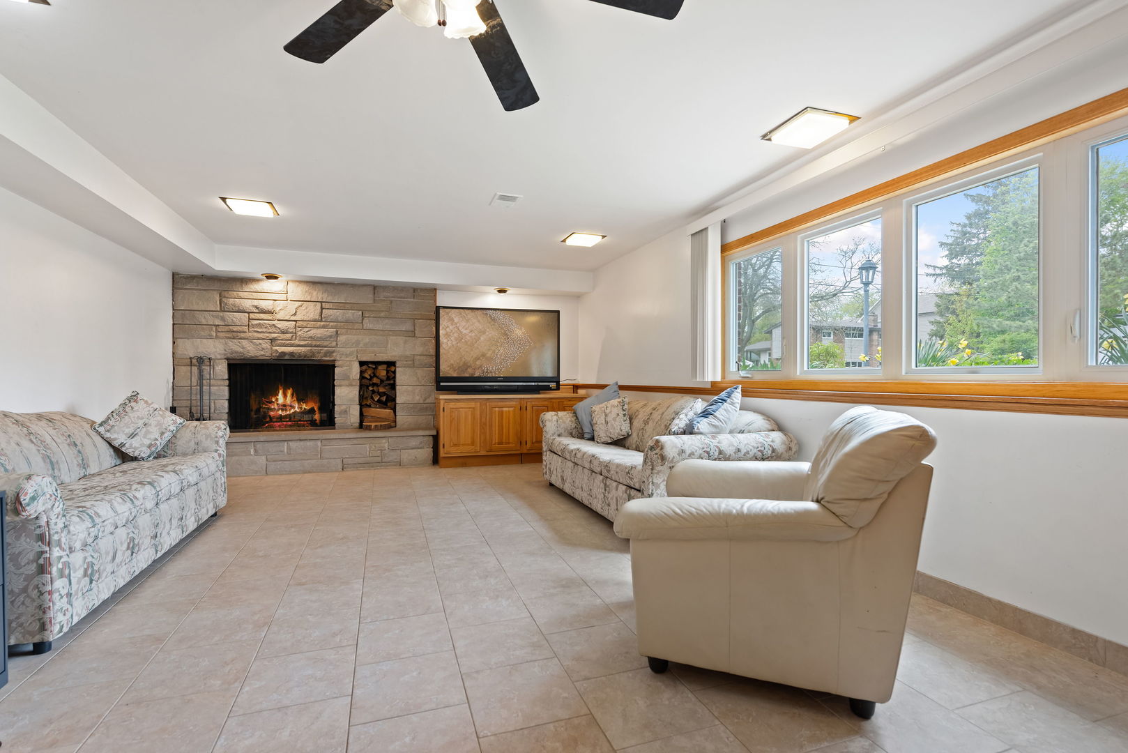 696 Lombardy Lane Deerfield, IL 60015 - Photo 18 of 26 a living room with furniture and a fireplace