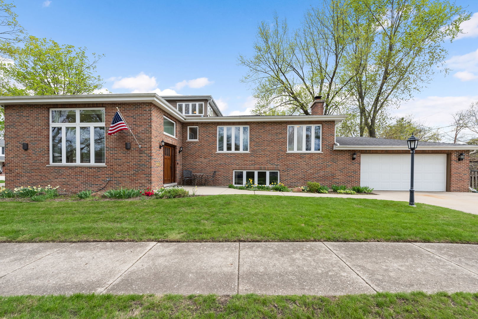 696 Lombardy Lane Deerfield, IL 60015 - Photo 2 of 26 a view of house with a yard