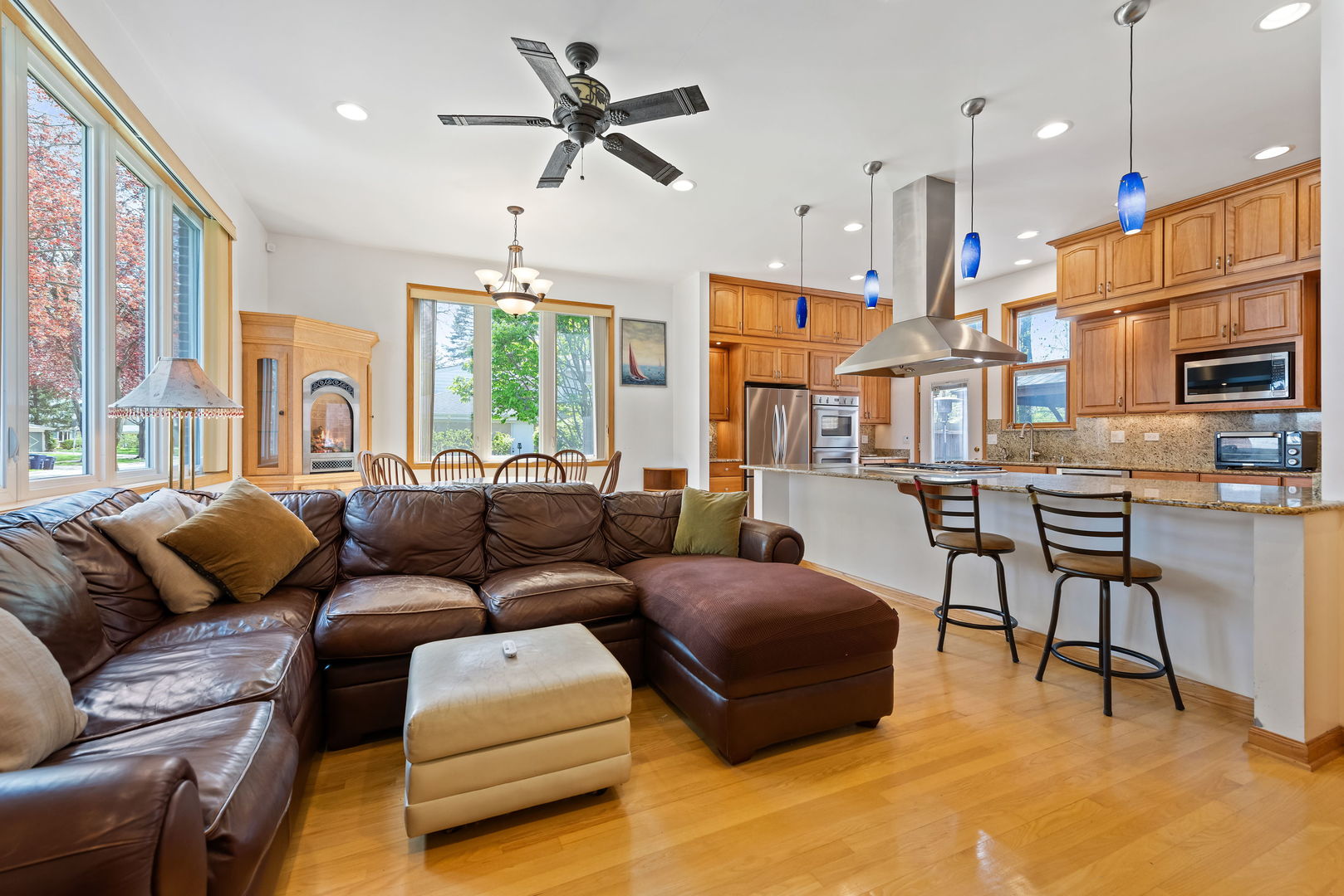 696 Lombardy Lane Deerfield, IL 60015 - Photo 8 of 26 a living room with furniture a ceiling fan and a window