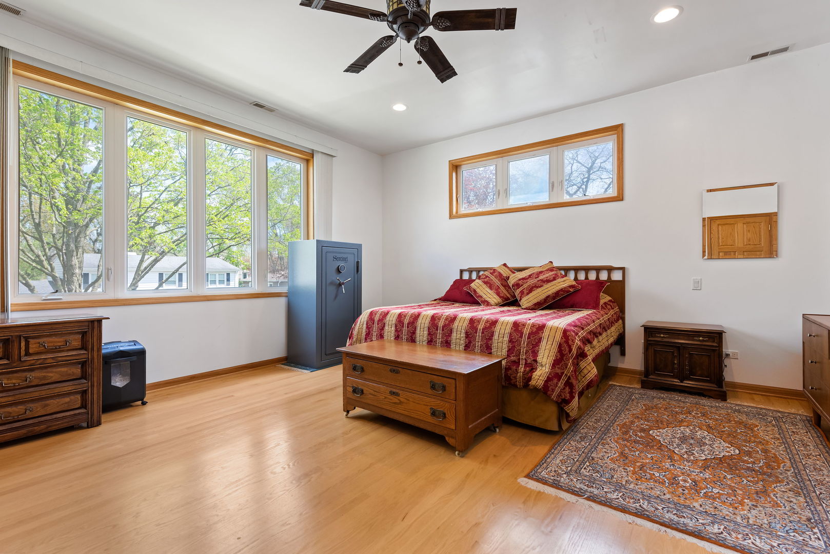 696 Lombardy Lane Deerfield, IL 60015 - Photo 9 of 26 a bedroom with a bed and a large window